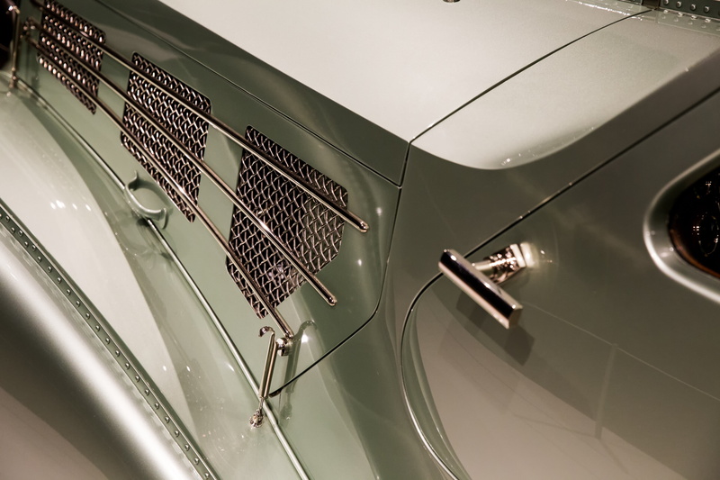 ceiling, low angle view, mode of transportation, air vehicle, automobile, indoors, text, machinery, close-up, motor vehicle, art deco, 1935 bugatti type 57s aerolithe
