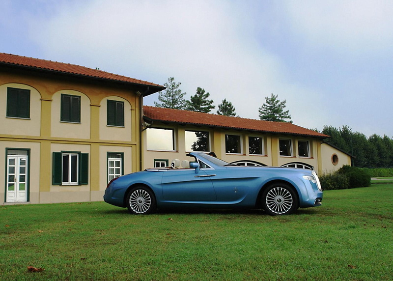 motor vehicle, garage, land vehicle, outdoors, nature, luxury, plant, architecture, mode of transportation, transportation, vintage car, day, grass, house