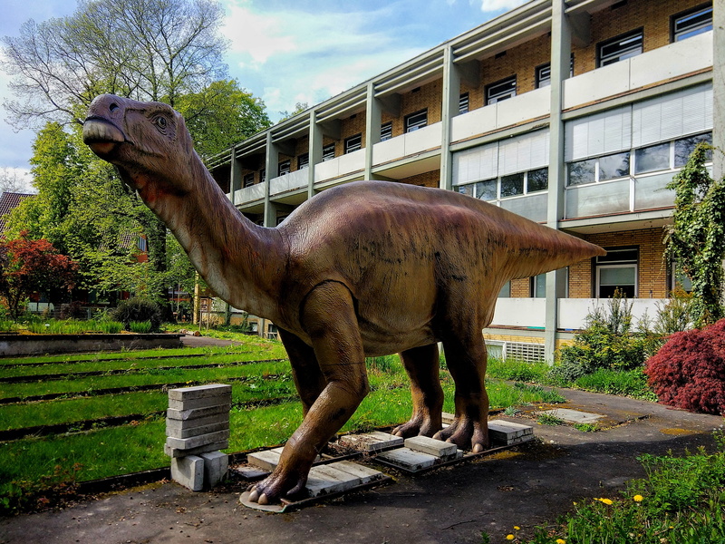 dinosaur, outdoors, representation, day, urtier, lizard, built structure, replica, building exterior, animal themes, cloud - sky, figure, 4K, no people