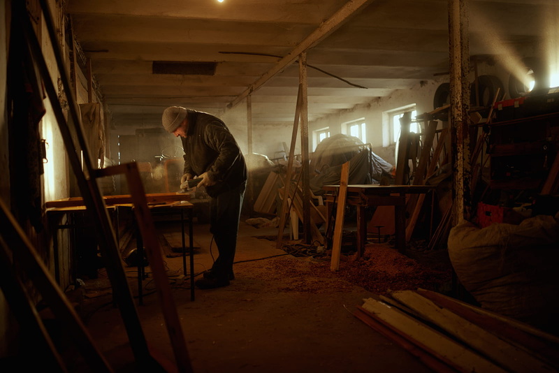 light, grinder, art and craft, production, facial hair, wear, occupation, 720P, real people, working, furniture, business, person, full length, man, room