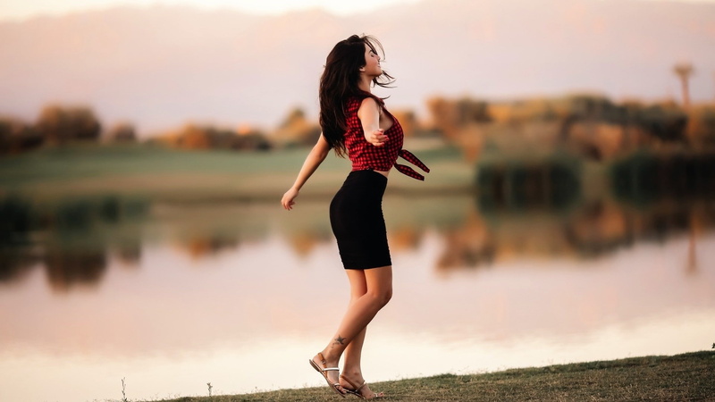 women model brunette long hair women outdoors skirt tattoo checkered shirt nature lake trees closed eyes happy depth of field dancing smiling happiness reflection