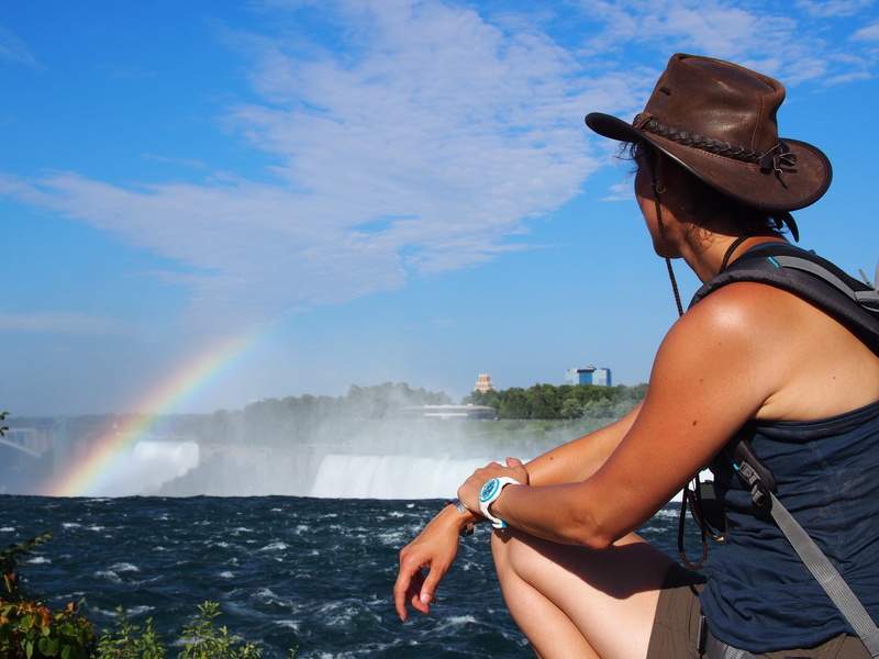 Niagra Falls, casual clothing, one person, waterfalls, scenics - nature, young adult, front, lifestyles, sitting, motion, flowing water, adults only, leisure activity