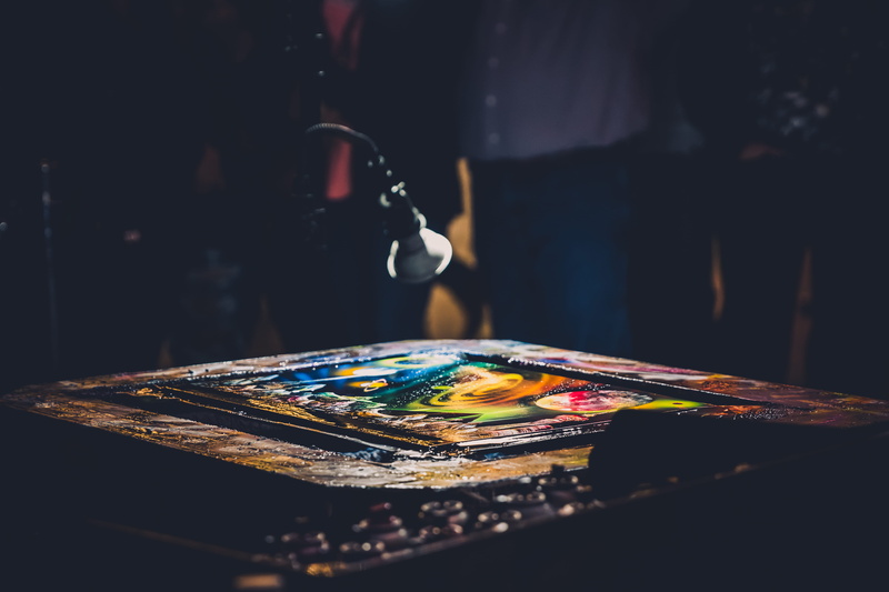 craft, skill, art, table, paper, 5K, indoors, lamp, focus on foreground, no people, urban life, art and craft, lighting, paint, brush, art and craft equipment
