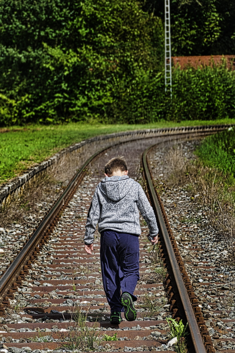 adult, the way forward, outdoors, seemed, cool, dangerous, plant, direction, teen, stupid, 5K, track, irresponsible, rail transportation, walking, rascal