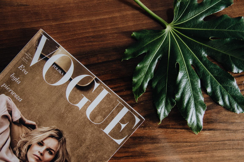 vogue, plant part, nature, magazine, plant, Poland, eva herzigova, one person, glasses, indoors, directly above, real people, table, food and drink, wood - material