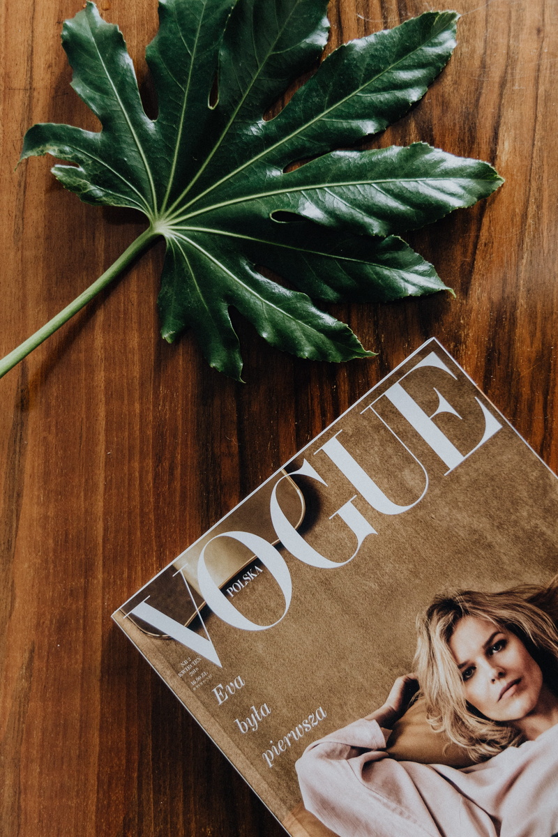 vogue, indoors, leisure activity, high angle view, plant part, one person, plant, wood, green color, table, fashion, women, hairstyle, flooring, eva herzigova