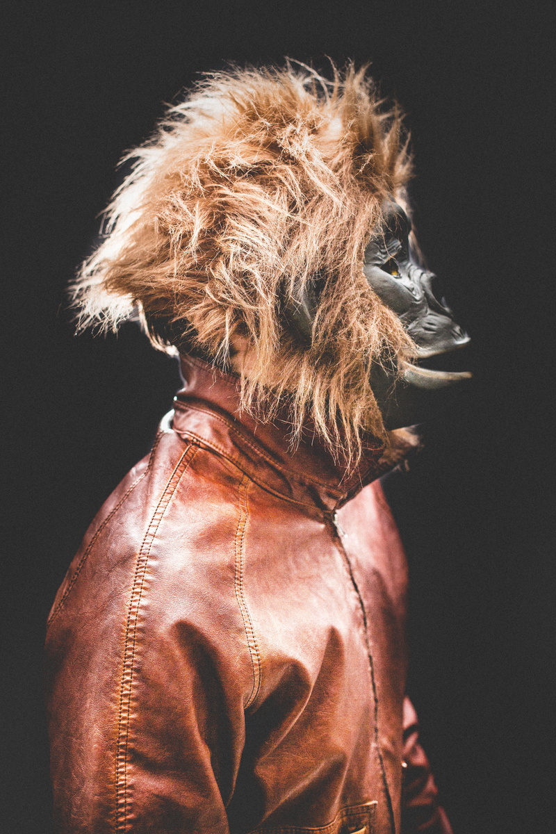human hair, rear view, indoors, men, real people, one woman only, animals, halloween, gorilla, lifestyles, wearing, costume, leather, background, people