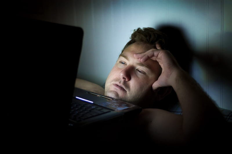 communication, technology, men, headshot, mid adult, man, wireless technology, portrait, computer, domestic room, one person, bed, chest, watching, something