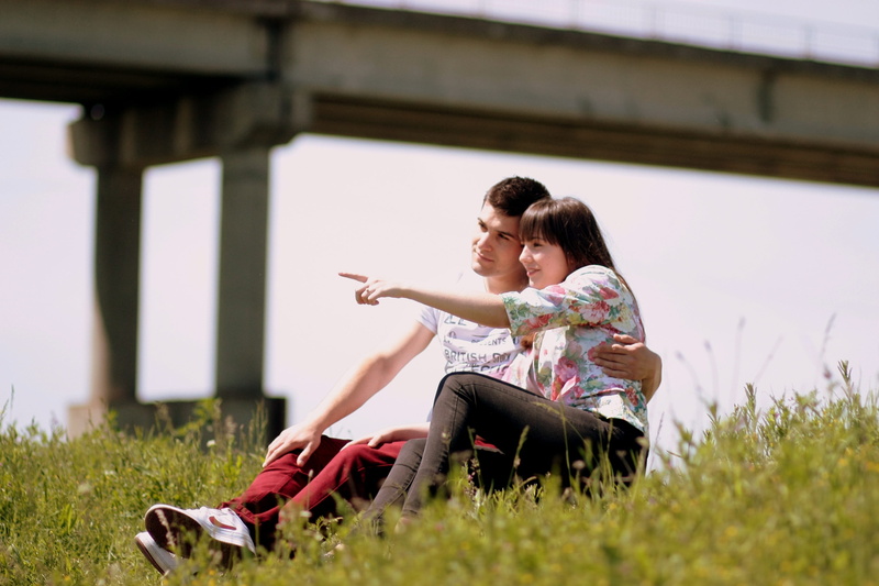 love, heterosexual couple, men, plant, hour, young women, girl, hug, grass, sitting, women, golden, couple - relationship, pointing, something, adult, happiness