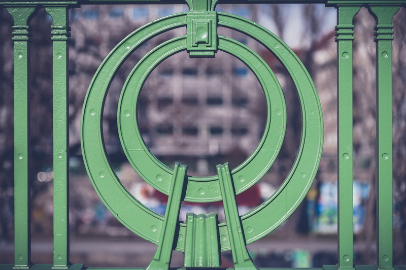 focus on foreground, pattern, close-up, 2K, no people, art nouveau, shape, auto post production filter, outdoors, design, day, green color, iron, outdoor play equipment