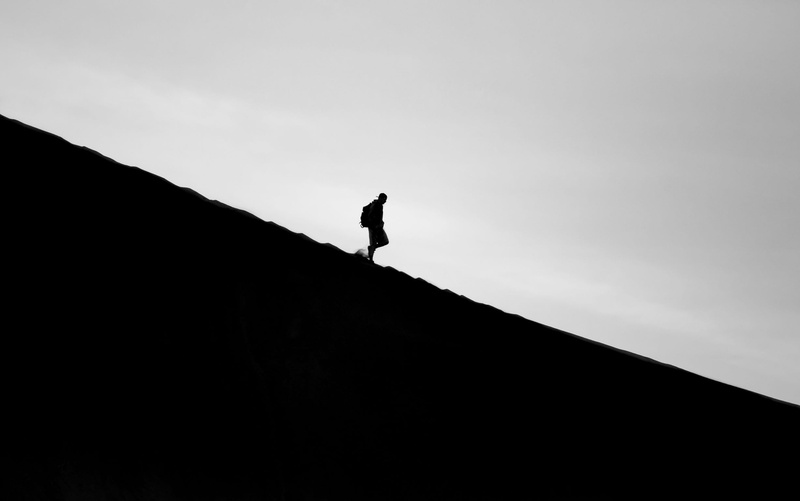 outdoors, one person, silhouette, male, standing, walking, real people, unrecognizable person, mountain, person, leisure activity, full length, copy space
