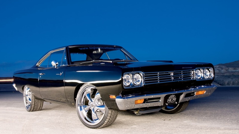 clear sky, land vehicle, headlight, no people, motor vehicle, side view, muscle cars plymouth roadrunner hemi, stationary, transportation, metal, mode of transportation