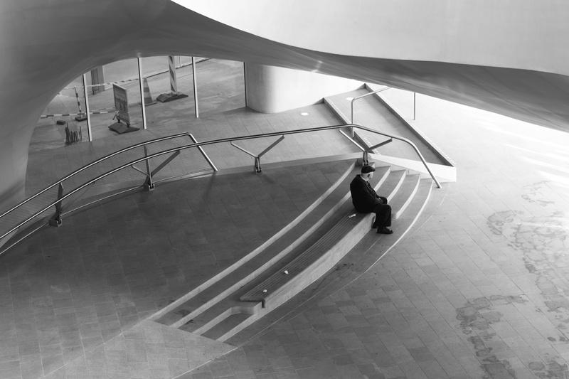 architecture, moving down, wile, black and white, day, empty, women, leisure activity, real people, person, built structure, wearing, photography, lifestyles