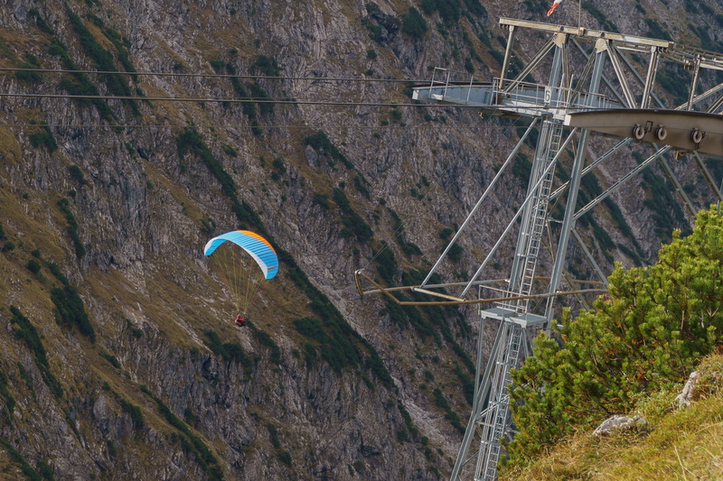 transportation, paragliding, steel, plant, autumn, human, adventure, cable car, day, mid-air, valley, landscape, alpine, non-urban scene, connection, mountains