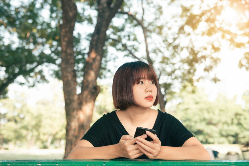 screen, real people, contemporary, young adult, telephone, cellphone, woman, portrait, teenager, smartphone, hands, using phone, standing, daylight, headshot