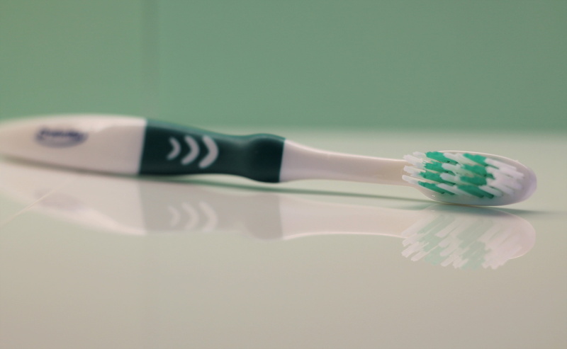 dentist, single object, reflection, bathroom, indoors, toiletries, body care, 4K, hygiene, colored background, oral, brush, studio shot, two objects, no people
