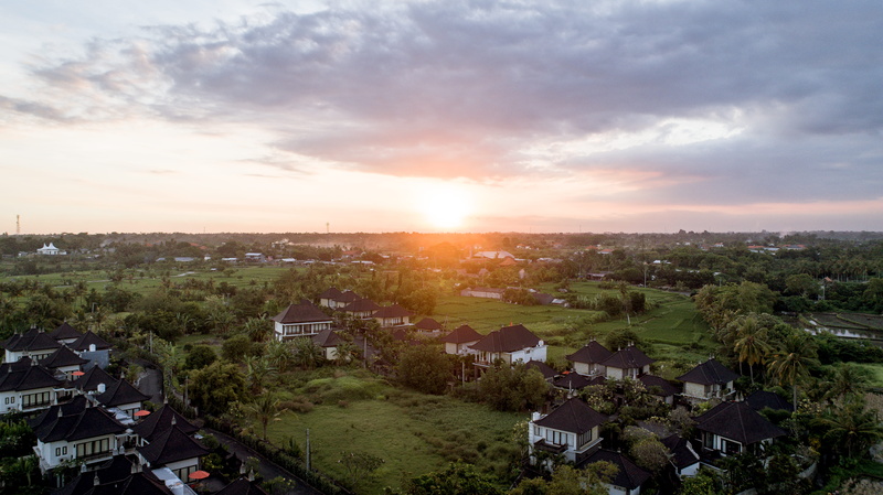 lens flare, denpasar, building exterior, bali, cloud - sky, outdoors, nature, residential district, environment, sky, architecture, tree, building, no people