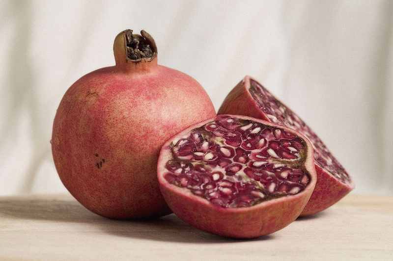 fresh, wellbeing, natural, pomegranate seed, healthy eating, light, halved, cross section, indoors, raw, table, pale, fruit, close-up, nutrition, nature