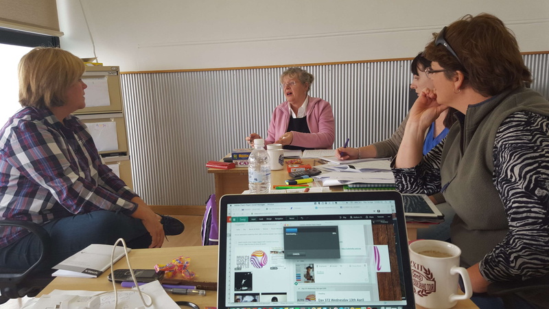 communication, sitting, occupation, connection, group of people, wireless technology, technology, tutoring, togetherness, computer, business, young adult