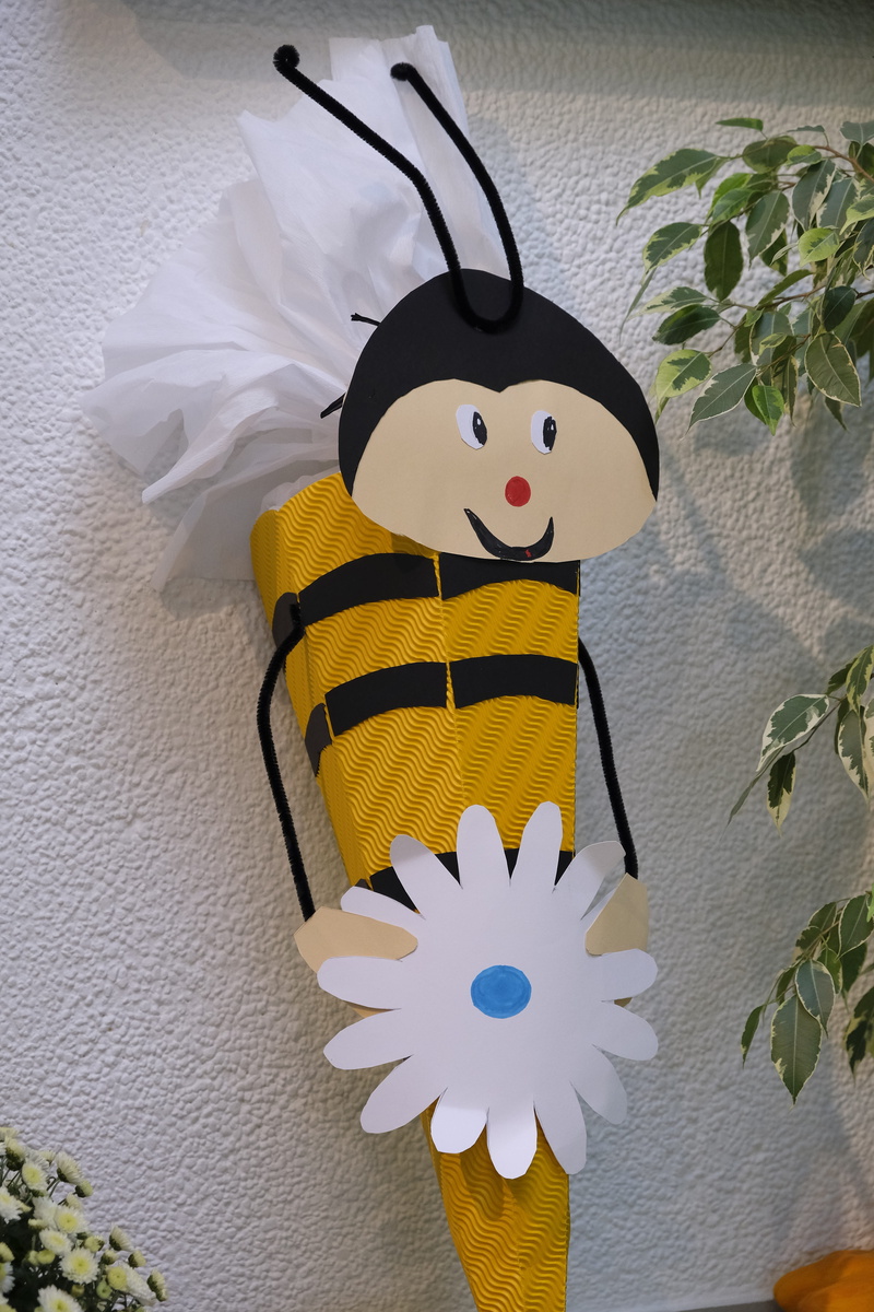 no people, human representation, hanging, wall - building feature, gifts, art and craft, school, schultüte, representation, school launch, children, close-up