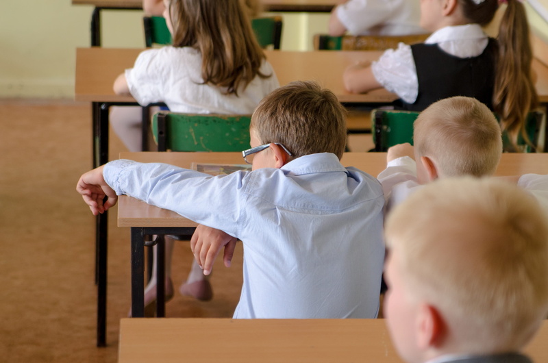 group of people, adolescence, children, sitting, the school year, rear view, indoors, classroom, table, adult, teenager, child, teacher, a small child