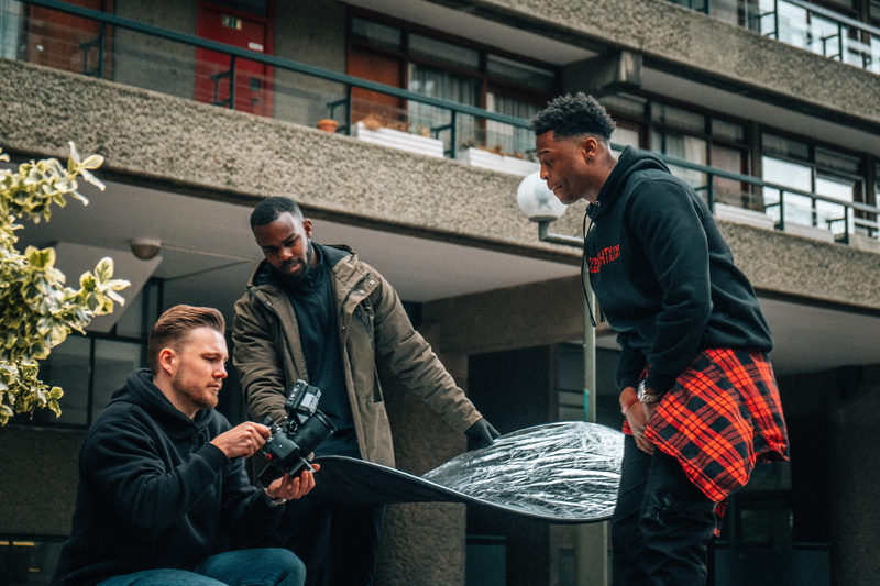 kilt, relaxation, plaid, three quarter length, jacket, tartan, real people, skirt, architecture, music video, day, undershirt, people, adult, video production set