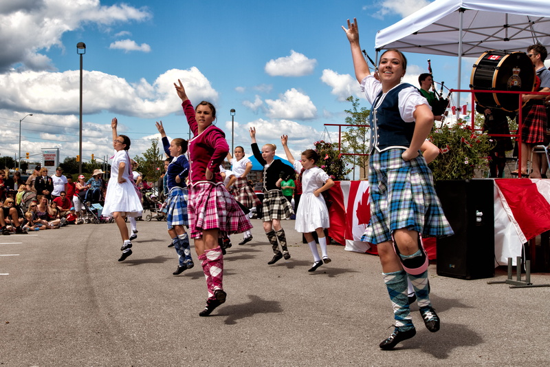 group of people, street, kilt, blue, girl, nature, leisure activity, dancing, canada, real people, festival, human arm, cloud - sky, skirt, celebration