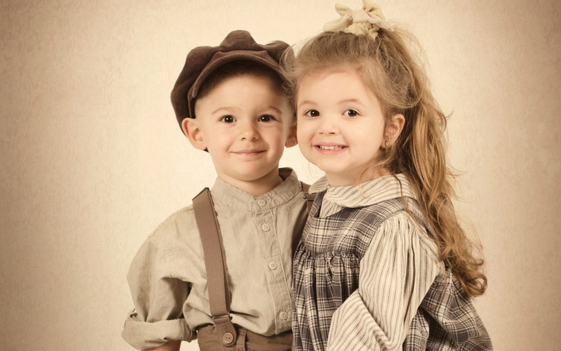 innocence, two people, studio shot, smiling, happiness, boy, sister, emotion, dress, women, toddler, looking at camera, togetherness, 2K, s, indoors, beige background