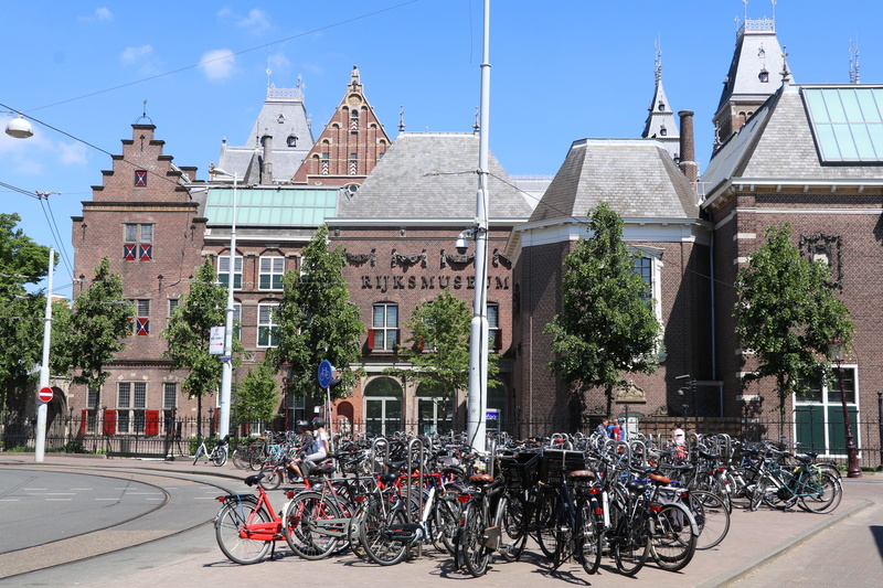 nature, plant, tree, rijksmuseum, transportation, museums, real people, sky, amsterdam, tourism, city, sunlight, outdoors, architecture, urban area, incidental people