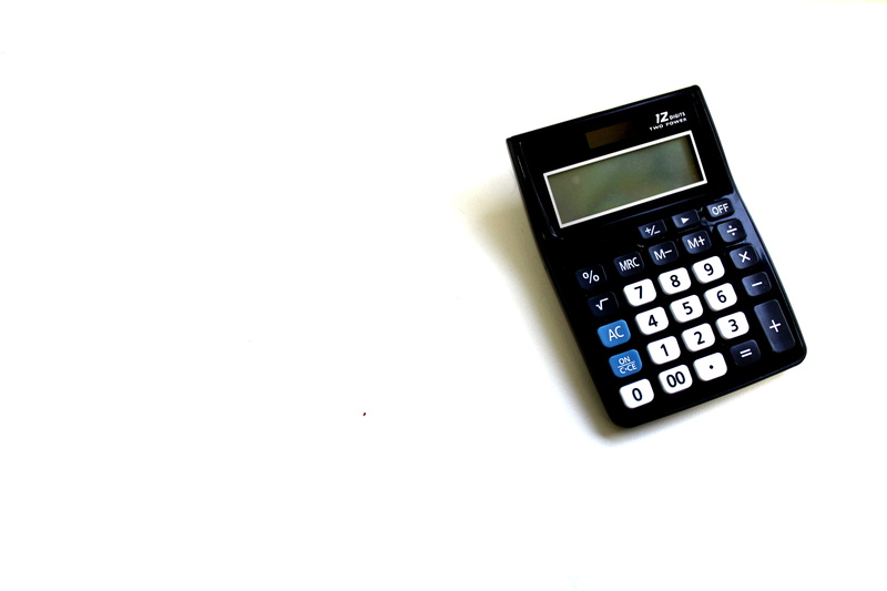 mathematical Symbol, cut out, symbol, electrical equipment, calculator, push button, copy space, white, finance, high angle view, indoors, liquid-crystal display