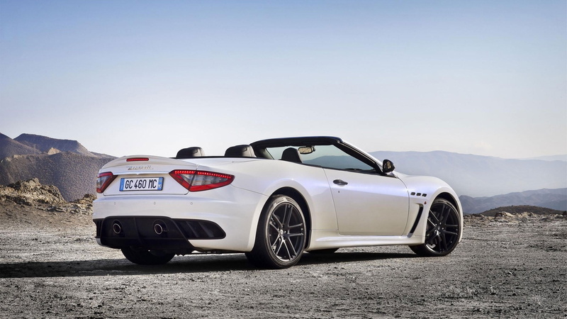 clear sky, sunlight, motor vehicle, luxury, white, wheel, mountain, land vehicle, Maserati GranCabrio, land, racecar, outdoors, day, copy space, car, environment
