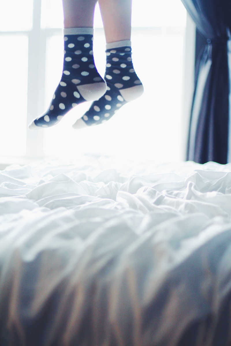 dot, bedroom, socks, polka, sock, legs, women, wearing, adult, low section, textile, pair, 5K, dots, limb, bed, white, feet, indoors, real people, human limb