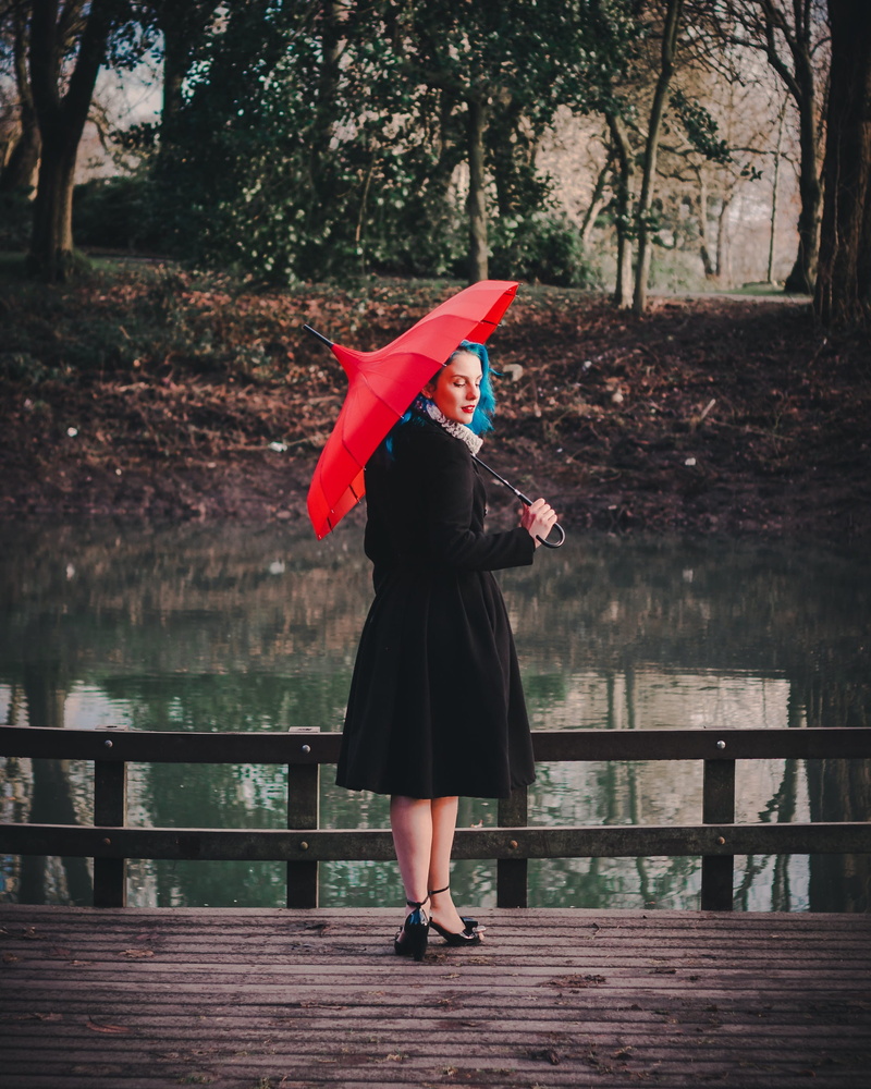 river, standing, day, red, contemplation, water, lifestyles, boards, umbrella, trees, clothing, elegant, bridge, woman, nature, pier, wood, leisure activity