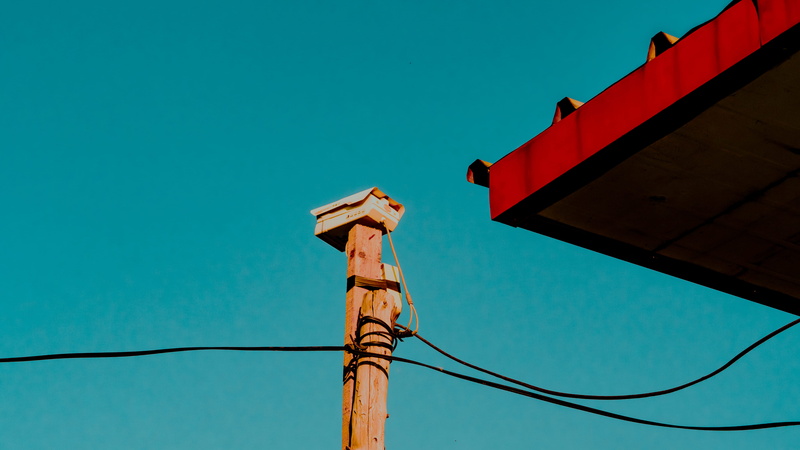 power lines, screen, no people, built structure, cable, electricity pylon, wood - material, electrical device, lamp post, wire, lighting equipment, electricity