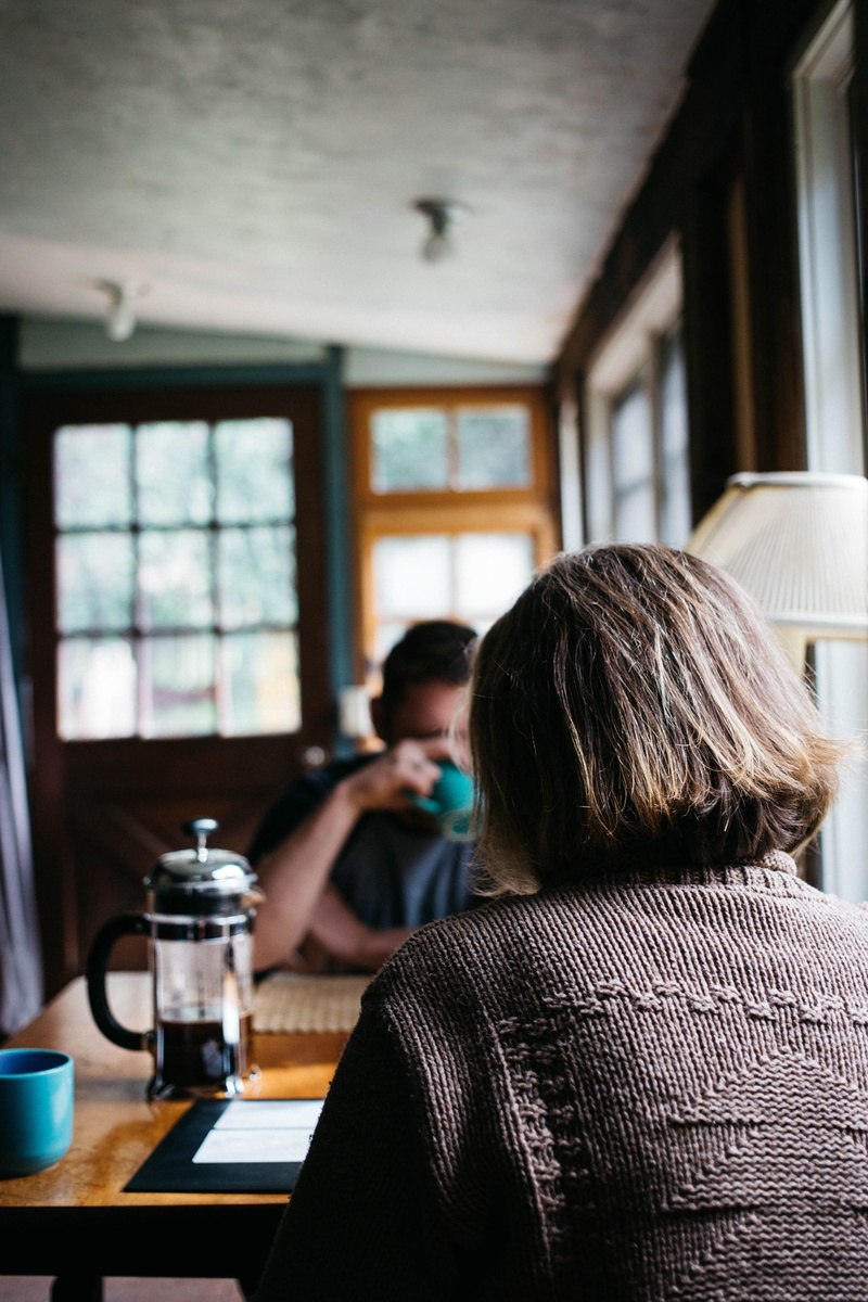 window, interior, looking, males, adult, discussion, indoors, crew, lifestyles, women, sweater, front, real People, woman in black, coffee, adults only