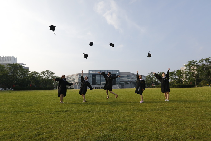 flying, graduation, wearing, vitality, jump, soccer, day, sport, group of people, motion, playing, plant, ball, team sport, men, university, classmate