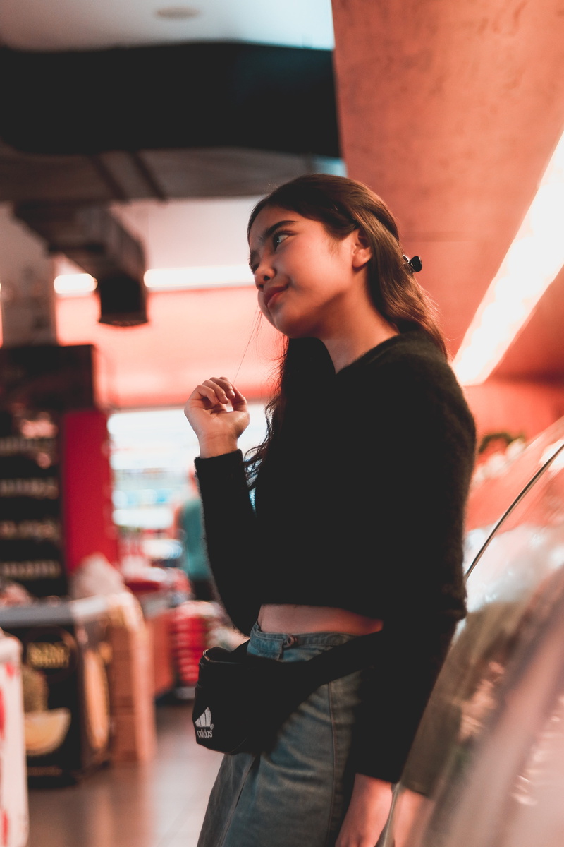 cup, portrait, beautiful woman, beauty, contemplation, beside, glow, hairstyle, people, smiling, standing, blur, glass, girl, female, red, neon, young adult