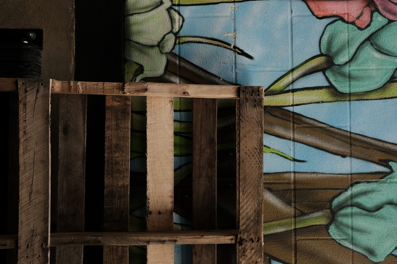 built structure, painting, architecture, stained glass, furniture, wood, banister, seat, safety, paint, metal, textile, plywood, wood - material, spraypaint