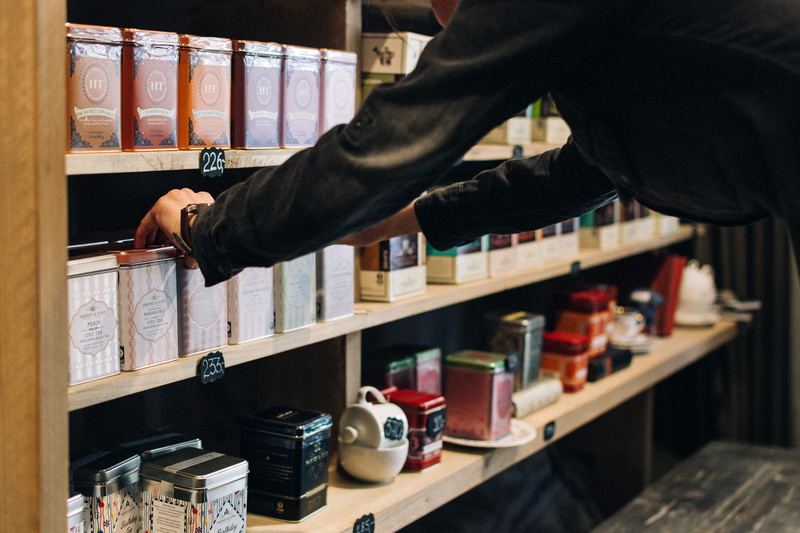 bottle, retail, retail display, men, shopping, variation, collection, choice, adult, drink, container, hands, tea, education, store, caucasian Ethnicity