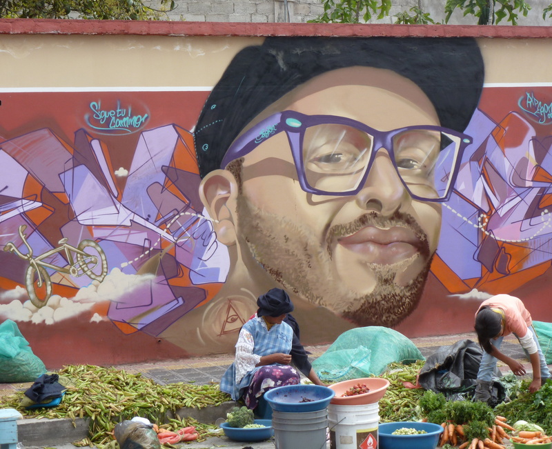 male likeness, women, urban, real people, art, scene, vendors, market, mural, front view, glasses, lifestyles, sitting, streetart, art and craft, males