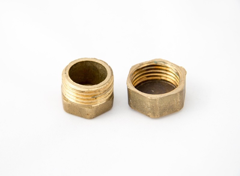 brass, gold colored, studio shot, brown, hexahedron, thread, cut out, two objects, geometric shape, bolt, man made object, white background, indoors, close-up
