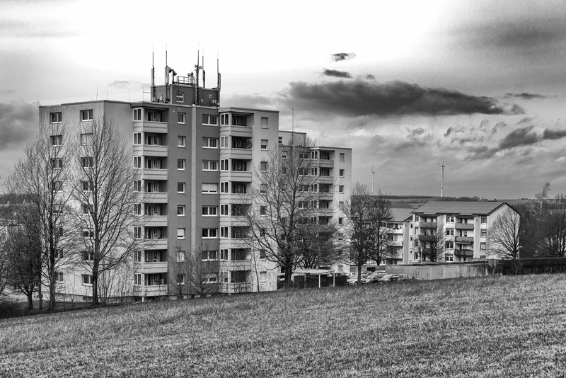 environment, house, sky, land, bare tree, city, at right angles, residential district, plant, grass, cloud - sky, contemporary, block of flats, industry