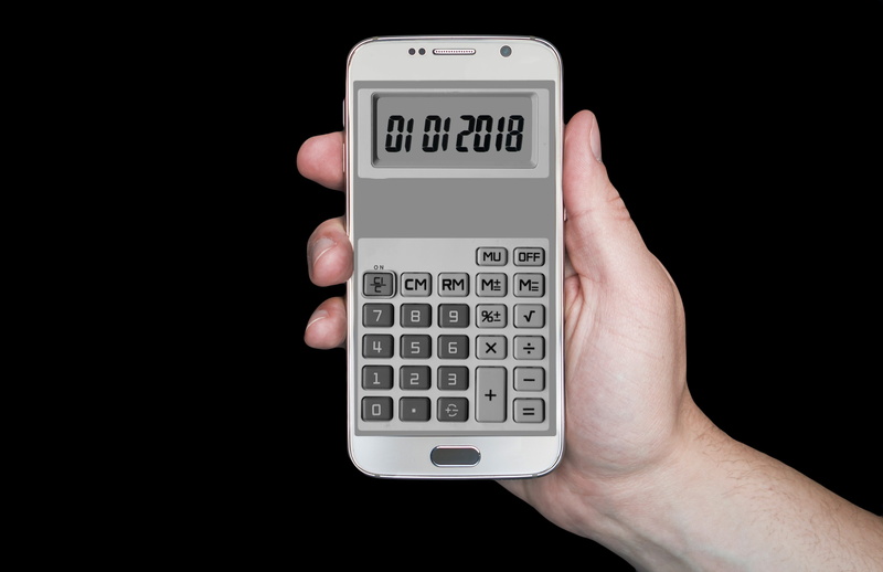 smart phone, new years day, how to calculate, people, connection, human body part, calculator, technology, studio shot, holding, hand, finger, portable information device