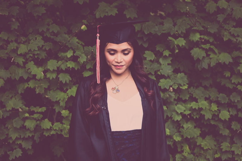 one person, graduation, plant, real people, contemplation, leisure activity, standing, women, nature, young women, gown, hairstyle, university, young adult