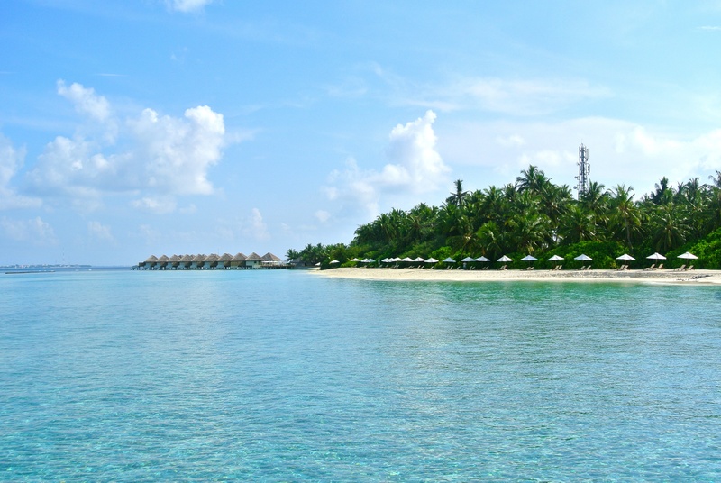 cloud - sky, maldives, near, sea, no people, beauty in nature, brown, beach, sky, tree, day, tranquil scene, huts, vocation, daytime, nature, palm tree