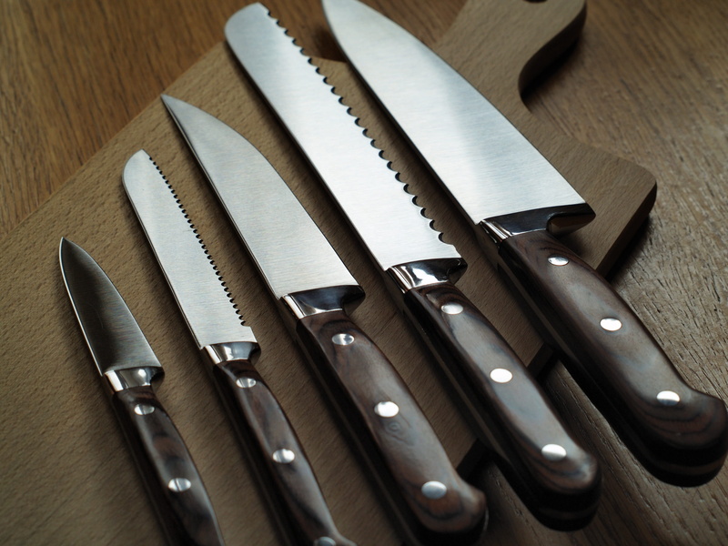 large group of objects, no people, handle, glossy, eating utensil, equipment, kitchen equipment, dagger, high angle view, close-up, group of objects, table
