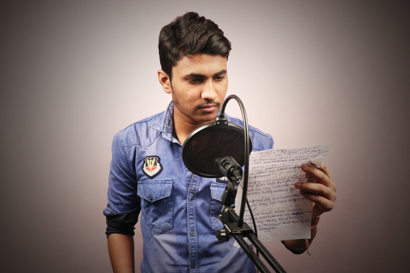 beautiful people, holding, publication, reading, indian filmmaker, artist, activity, one person, waist up, young men, indian boy, 5K, voice over artist