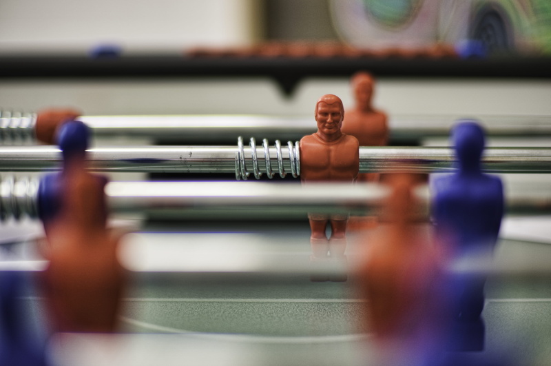 team sport, figurine, foosball, motion, focus, table, fusball, shallow, indoors, competitive sport, recreational pursuit, leisure activity, people, selective focus