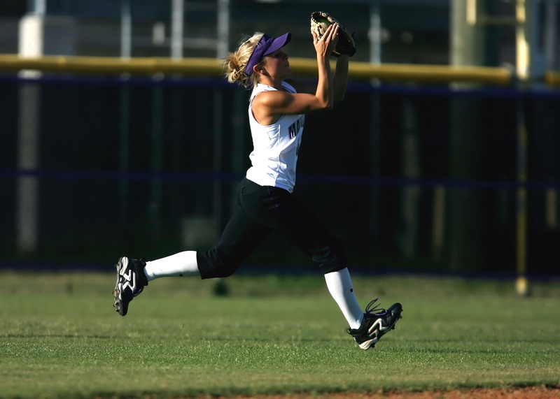 one Person, mid-air, outfielder, people, focus on foreground, catch, girls softball, youth, child, softball, human arm, teenager, outdoors, full length