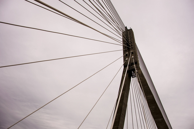 no people, pole, bridge construction, sailing, steel, bridge - man made structure, reflection, low angle view, passenger craft, construction, transportation